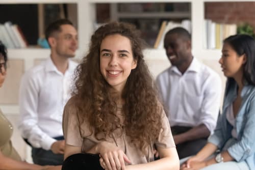 Woman in group therapy session